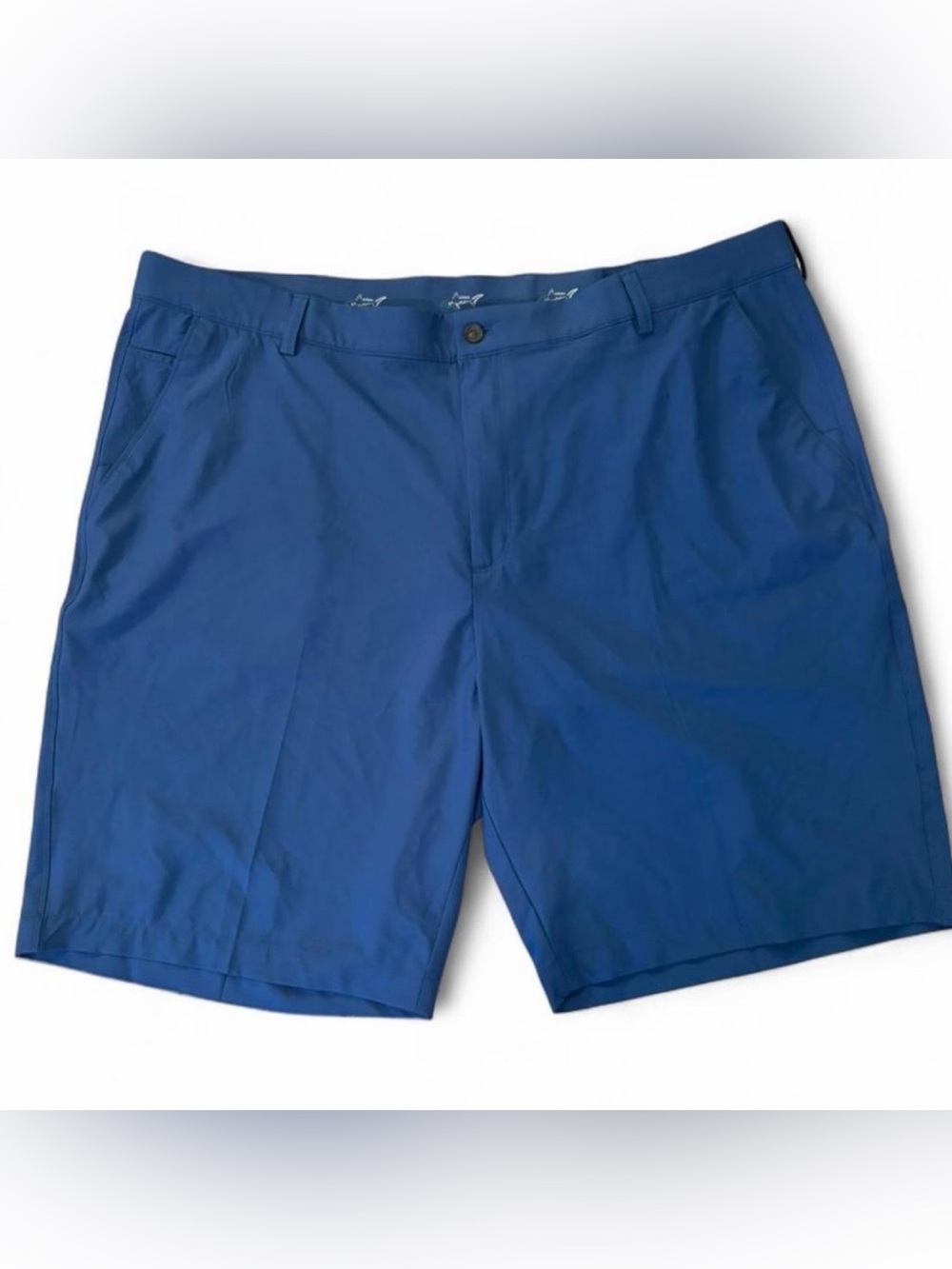 Greg Norman blue golf shorts. Size: 44", inseam 10”